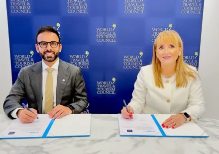 WTTC and World Governments Summit representatives sign a global travel partnership at a formal event