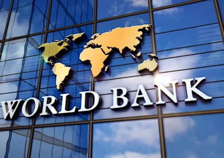 World Bank building with a world map, highlighting global efforts to expand STEM and AI education worldwide.