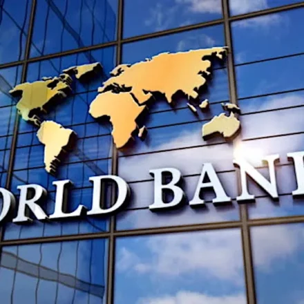 World Bank building with a world map, highlighting global efforts to expand STEM and AI education worldwide.