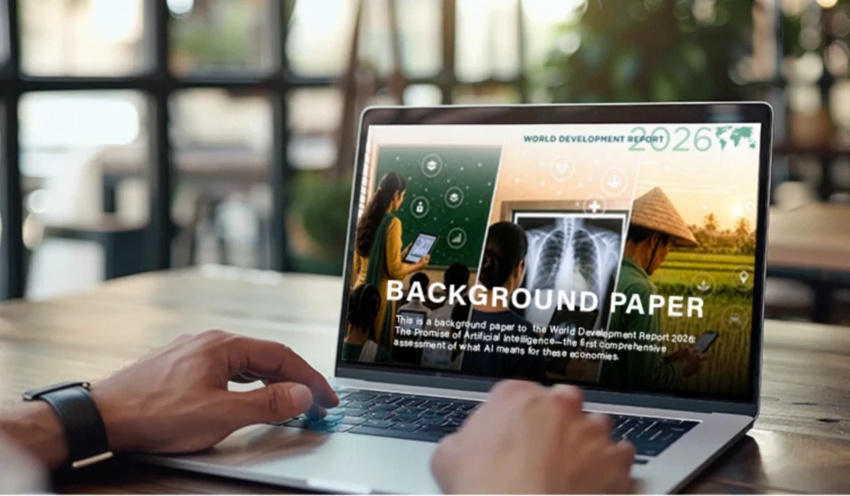 World Bank WDR 2026 Highlights Rapid Global AI & STEM Education Expansion Laptop displays World Bank 2026 WDR background paper with education, medical and farming scenes.